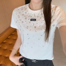 MIUMIUブランドコピー 2026HOT新作登場 NXZ023 ミュウミュウ レディース 半袖Tシャツ